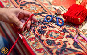 embroidering handmade rugs at home and