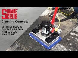cleaning concrete with square scrub