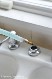 replace a broken kitchen sink sprayer