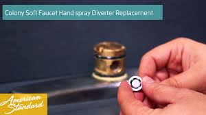 how to replace the hand spray diverter