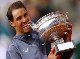Rafael nadal is at the centre of a bizarre outfit controversy, with fans questioning the legality of his shirt colour at the french open. French Open 2019 Rafael Nadal Defeats Dominic Thiem Wins 12th Title Newsmobile