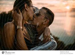 couple in love kissing at sunset a