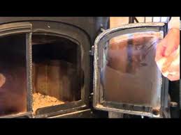 how to clean fireplace glass removing