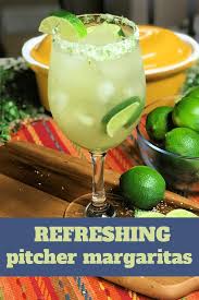 refreshing pitcher margaritas with a