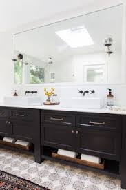 This beautiful bathroom by palmer todd shows off its traditional style with a black double vanity and large cabinets on either side. 40 Best Black Bathroom Vanities Ideas Black Bathroom Bathroom Design Bathroom Decor