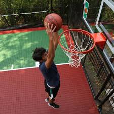 In professional or organized basketball, especially when played indoors, it is usually made out of a wood, often maple, and highly polished and completed with a 10 foot rim. What S The Best Flooring For An Outdoor Home Basketball Court