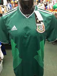 The kit, styled in the national team's traditional yellow and blue, features a white outline surrounding the badge that depicts the country's borders. Mexico Soccer Jersey Jersey On Sale
