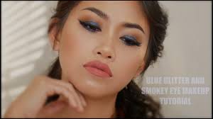blue glitter and smokey eye makeup