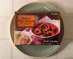 I didn't have ginger, and only cooked the onions for 10 minutes. Trader Joe S Shrimp Tikka Masala With Cumin Rice Review Freezer Meal Frenzy