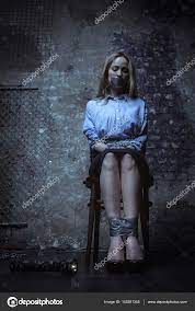 Girl sitting on chair tied up Stock Photo by ©yacobchuk1 145281345