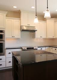 A Stainless Steel Undercabinet Hood Installed Above An
