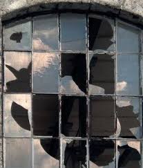 broken window pane in a metal frame