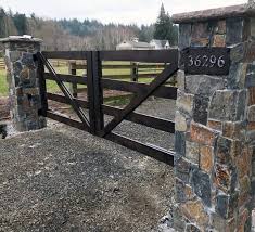 If you believe that the first impression is the most important one, you can't ignore the importance of your driveway entrance. Top 60 Best Driveway Gate Ideas Wooden And Metal Entrances