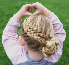 Braids and buns and bows, oh my! A Lovely Stylish Side Braid Hairstyle For Little White Girls Is Shown Below In The Image It Is Wonderfully D Little Girl Braids White Girl Braids Hair Styles