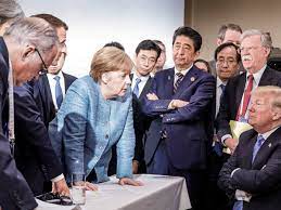 Merkel's G7 photo says everything about Trump's diplomacy – or does it? | G7 | The Guardian
