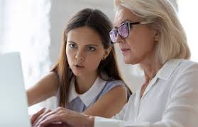 Female Financial Advisor Consulting A Client - Rainmaker