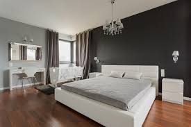 bedroom with wooden flooring truly