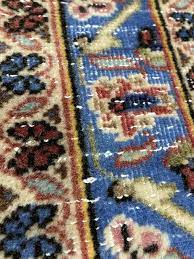 white specks on your oriental rug