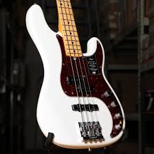 The american ultra precision bass features a unique modern d neck profile with ultra rolled fingerboard edges for hours of playing comfort, and the tapered neck heel allows easy access to the highest register. Fender American Ultra Precision Bass Guitar In Arctic Pearl With Case Ken Stanton Music