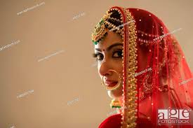 indian bride looking back stock photo