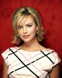Short to medium layered hairstyles back flips out face hair, cute hairstyles for short hair. What Race Is Charlize Theron Hair Flip Chin Length Hair Bob Hairstyles