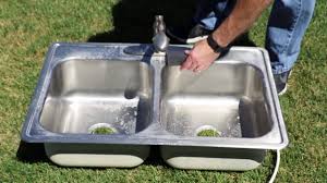 clean a stainless steel sink and remove