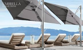 Outdoor swivel lounge chair with removable cushion and umbrella shade. All Umbrellas Rh
