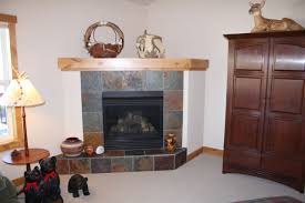 decorating corner fireplace mantels