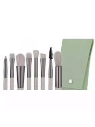 set of 8 makeup brushes in a mint case