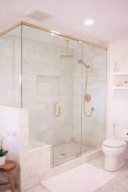 Glass And Brass Shower Enclosure With