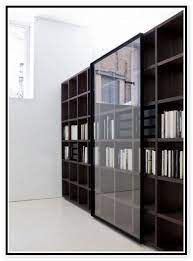 Mural Of White Bookcase With Glass Door