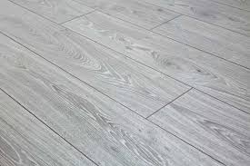 Best price guarantee · schedule virtual visit · financing available Series Woods Professional 12mm Laminate Flooring Grey Oak