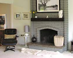 Painted Brick Fireplace In A Light Gray