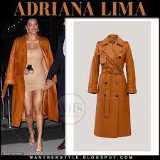 Adriana Lima In Orange Leather Coat And