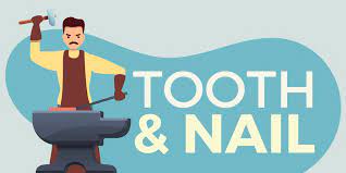 tooth and nails idiom meaning and origin