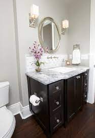 Hardware is like jewelry in a bathroom. Powder Room Need To Match Kitchen Cabinets