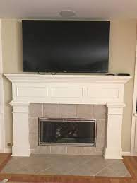 tv over fireplace too high