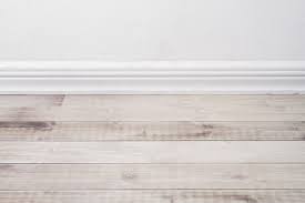 install baseboards on a sloped floor