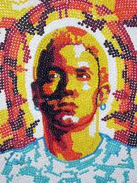Enrique Ramos used more than a thousand M&amp;Ms to create a portrait of—guess who?—Eminem. The work has been acquired by Ripley&#39;s, which will hang the piece in ... - eminem_mms