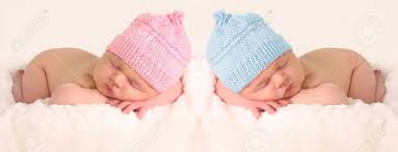 Newborn Babies In Pink And Girl Knitted Hats Stock Photo Picture