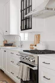 white cabinets with gl panels