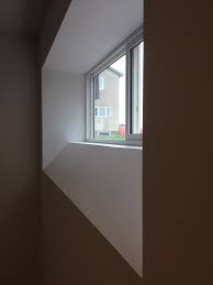 Angled Basement Window Frame