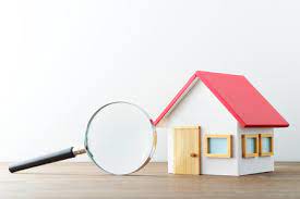 Property Insurance Concept With House Toy And Magnifier On White Wooden  gambar png