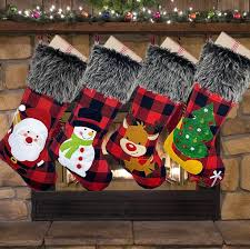 Christmas socks hanging on fireplace in room interior. Plush Christmas Stocking Gift Bags Large Size Latticed Candy Bag Xams Tree Decoration Socks Ornament Christmas Gift Wrap Discount Christmas Decorations Outdoor Discount Christmas Ornaments From Timelesszeng 3 07 Dhgate Com