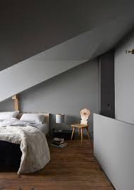 grey walls and ceiling in attic bedroom