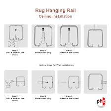 Adjustable hooks on the suspenders carry the art. Rug Hanging Rail System Set Carpet Display Track Hangers Kit