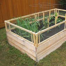 diy raised bed removable pest gate