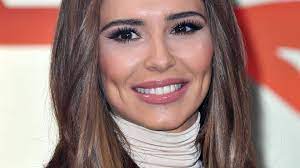cheryl reveals washboard abs in new