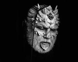 devil man with fictional makeup demon