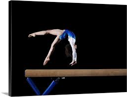 gymnast flipping on balance beam side